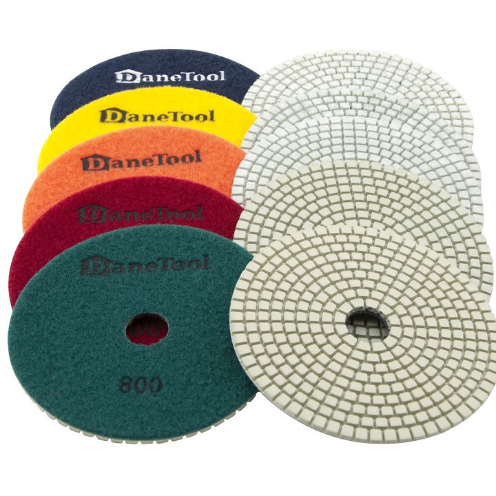 Sortiment med 10 Slibepads i grøn, rød, orange, gul, blå og grå farve til tørslibning, vådslibning og polering. Diameter Ø125 mm. 